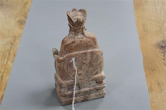 A Chinese stone carving of an immortal, possibly 19th century, height 19.5cm